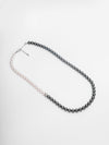 Dual-Tone Elegance Pearl Necklace – Black & White Harmony