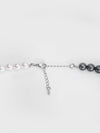 Dual-Tone Elegance Pearl Necklace – Black & White Harmony